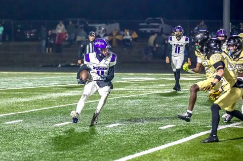 Bryson Stowe breaks to the outside for a gain on the play.