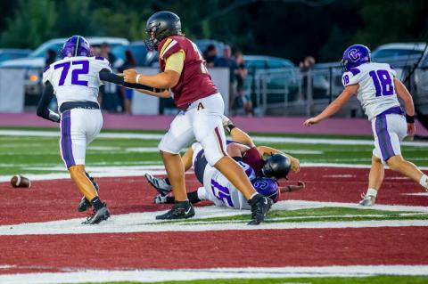 Easton Loudermilk brings down a Wampus Cat as Ethan Nelson and Reid Ables come in to assist.