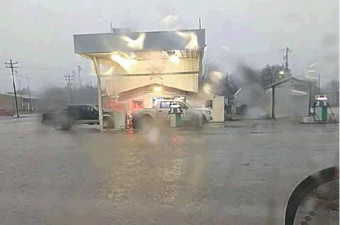 —Photo courtesy of Tupelo Fire Chief Rick Ellis                                Downtown Tupelo was hard hit with torrential rains Friday; Sharon Pickens’ Kountry Store in the background.
