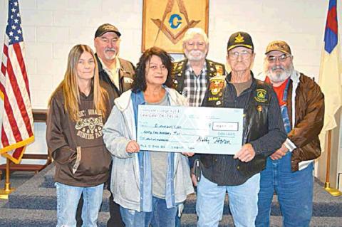 TOP PICTURE — Coalgate Masonic Lodge #211 presents a check to Diana Pebworth-Watkins to help with medical expenses for her late husband, Glenn Watkins. Glenn passed away December 2, 2019. The $4,200 check represents funds raised at a chili and beans ben
