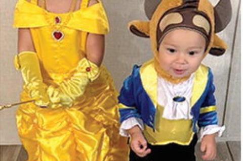 Happily ever after, Halloween-style: Reikyn and Lennon Griffith, the children of Peydon and Sidney Griffith, charmed trick-or-treaters as Beauty and the Beast.