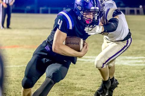 Bryson Stowe cuts to the outside to break the tackle. Pictures Courtesy of Sherry Loudermilk