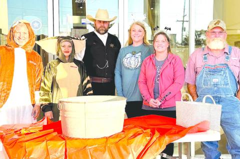 SOME ELECTED OFFICIALS PASSED OUT CANDY TO THE TRICK OR TREATERS DURING THE CANDY CRAWL  SATURDAY NIGHT NOVEMBER 2.  